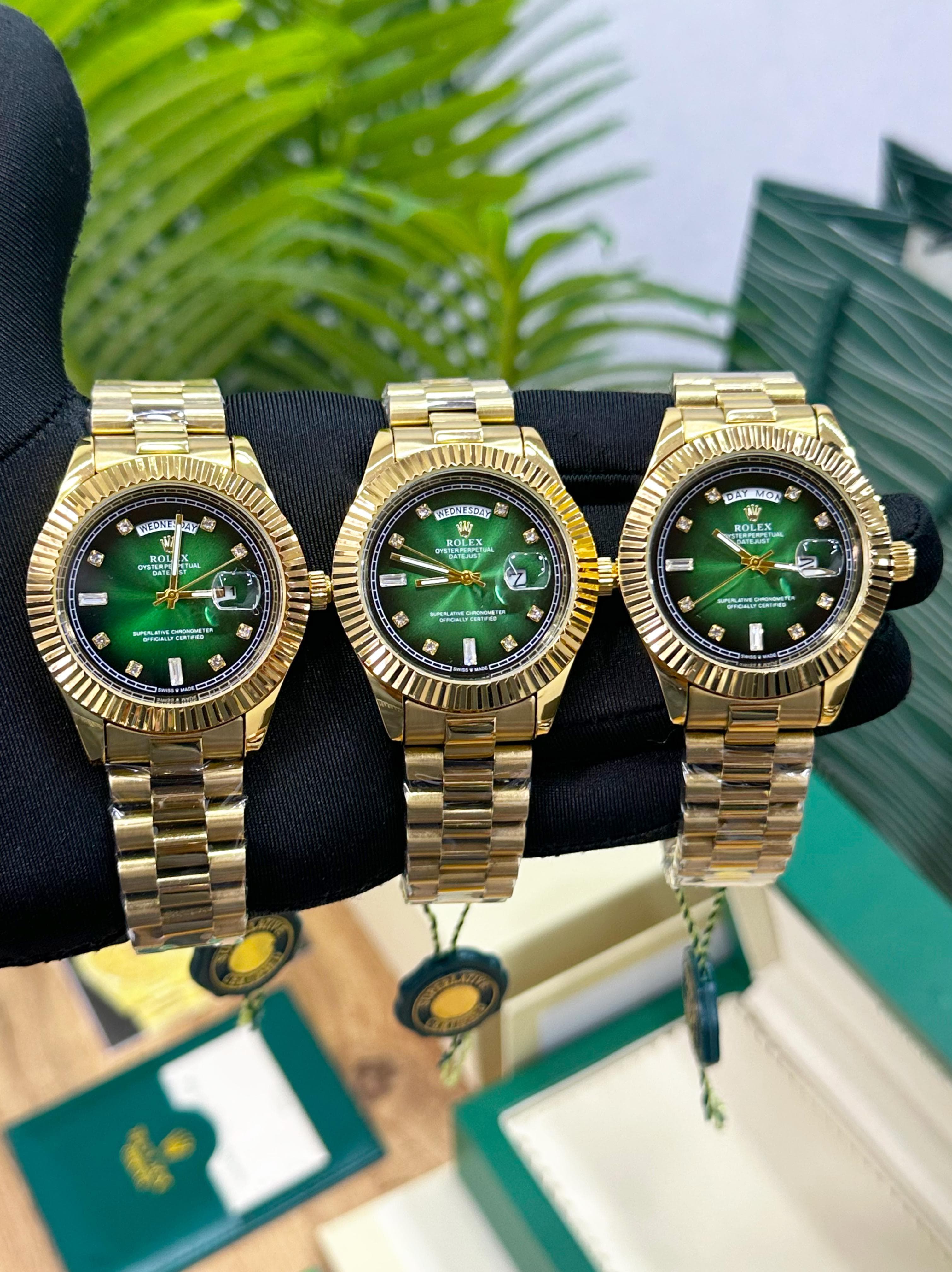 luxury Watch day date gold green premium